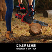 Photo of Craftsman chainsaw CMCCS620B cutting log outdoors, red and black, 12-inch bar and chain visible.